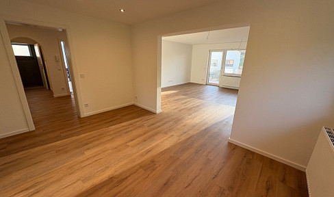 Completely renovated ground floor apartment.