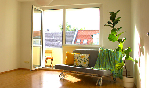 Spacious 2-room apartment in a quiet side street, with a green view.