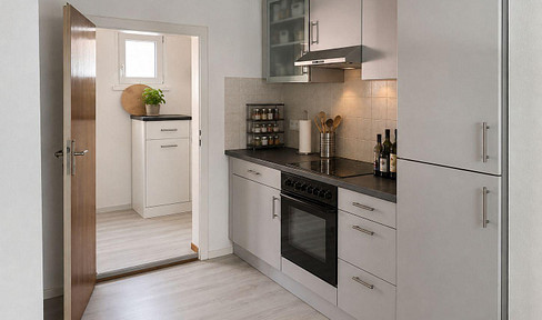 Charming house with a garage, barn, and garden, located in the heart of Dettenheim.