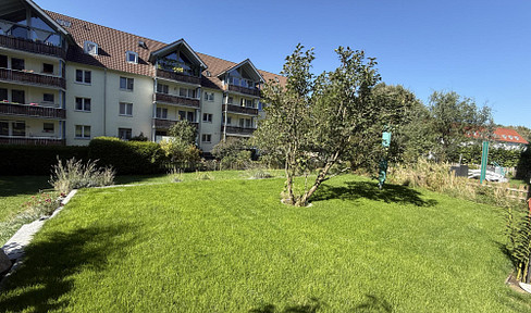 Upper-floor apartment with approximately 85 square meters, plus a share of the garden – enjoy barrier-free living between the Isar River and the Alps.