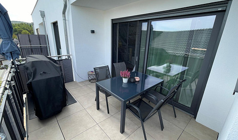 Modern living in a new construction meeting KfW-40 standards – featuring an open-plan layout and two bedrooms.
