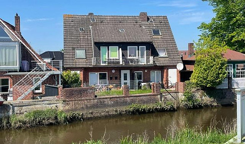 Apartment building on the waterfront with 4 small apartments.