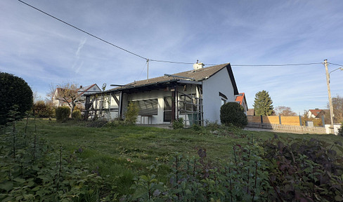 Spacious single-family home with a beautiful garden for sale.