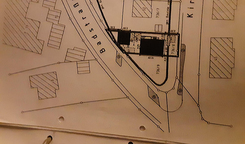 Land.
Plot of land.
Property.
Real estate.
(Context-dependent: could also be "lot" or "parcel" depending on the specific situation).