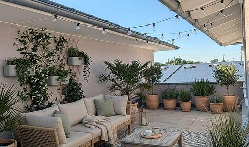 Modern, renovated 3-room apartment with rooftop terraces, located in a central area of Buchloe.