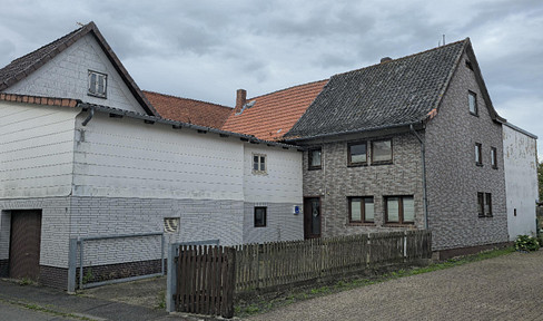 Terraced house with garden and terrace.