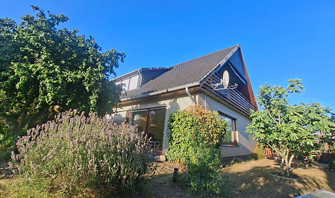 Two-family house - quiet and centrally located, with a beautiful garden.