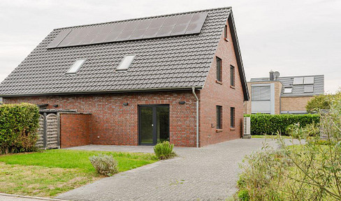 Energieeffiziente Doppelhaushälfte mit Luftwärmepumpe und Photovoltaikanlage