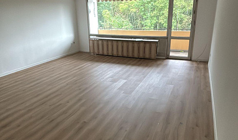 3-room apartment on an upper floor, with a balcony, cellar, and optional garage.
