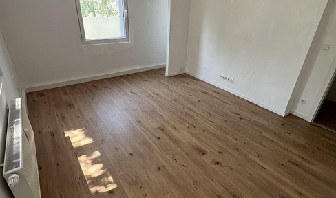 Sanierte und helle 2-Zimmerwohnung m. gr. Wohnküche + Duschbad