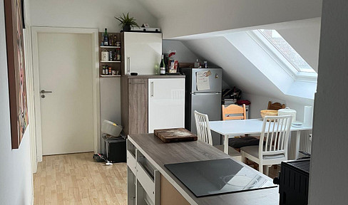 Beautiful 4-room apartment in the attic of a building for rent in Karlsruhe-Grünwinkel.