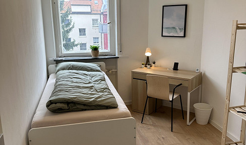 Furnished studio apartment with a private kitchenette | ideal for students and working professionals.