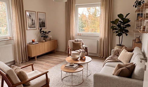 Brand new apartment after extensive renovation: Bright 3-room apartment with fitted kitchen, balcony, and garage.