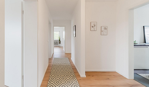 4-room apartment with a balcony and a garage. The building and apartment will be extensively renovated in 2026.