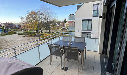 Exclusive and accessible 3.5-room apartment with balcony and fitted kitchen.