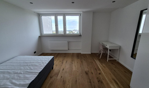 Room for rent in a shared apartment with mountain views, located in Feldmoching – Ratholdstraße 24, Munich.