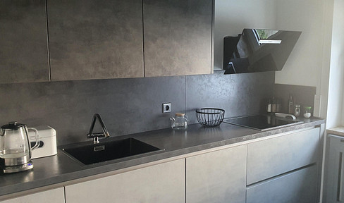 Modern 4-room apartment with a new fitted kitchen and a garage.