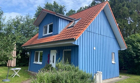 Swedish-style house in a green setting.