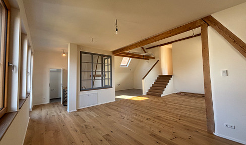 Einzigartiges Wohnen – Loftwohnung mit sonnigem Balkon & eigenem Garten