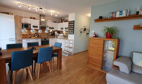 Modern 4-room apartment with a balcony, elevator, and underground parking space in Thon.