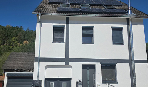 Modernized single-family house with a photovoltaic system.
