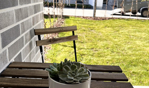 Erstbezug/Neubau Stilvoll eingerichtete Erdgeschosswohnung mit Garten