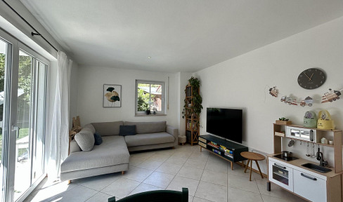 Attractive, well-designed 4-room ground-floor apartment with a large garden.