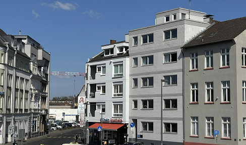 Residential and commercial building, directly adjacent to the high-speed train station - consisting of 5 separate units.