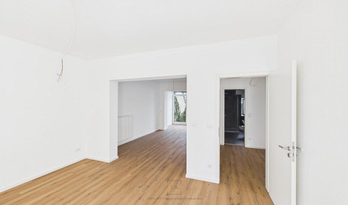 **ERSTBEZUG** Lichtdurchflutete Gartenwohnung nahe des Stadtzentrums