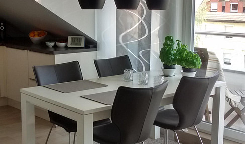 Modern 3-room attic apartment with a Swedish stove, balcony, and high-quality finishes.