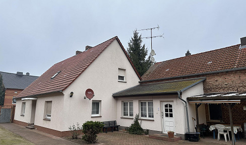 Spacious farmhouse with barn, stables, and great potential.