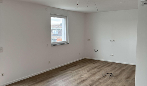 NEW CONSTRUCTION - FIRST OCCUPANCY - 3-room apartment with balcony, fitted kitchen, and parking space in Cologne Niehl.
