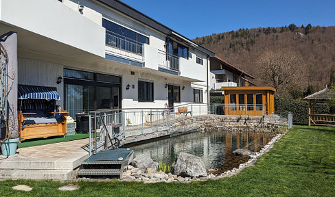 Multi-family house suitable for both living and working, with approved commercial use/vacation rental potential, located on a hillside.