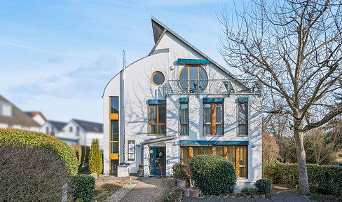 Geschäftshaus mit Penthouse-Wohnung in Friedberg Fauerbach