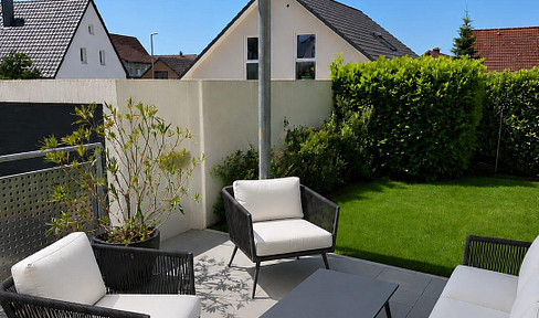 Modern 3.5-room ground floor apartment with a large garden.