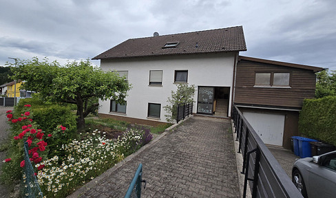Commission-free: House with separate apartment and building plot in Dellfeld/Falkenbusch.