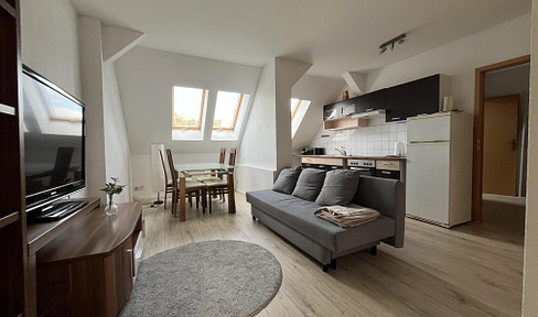 teilmöblierte DG-Wohnung mit EBK