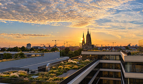Unique property with panoramic views: Modernized apartment featuring a designer bathroom, a loggia, and a view of the Frauenkirche (Church of Our Lady).