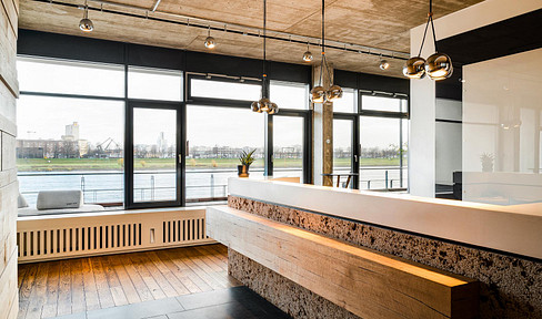 High-quality office space in the Rheinauhafen district, with a view of the Rhine river.