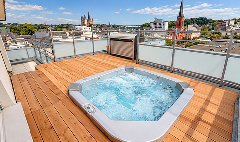 Penthouse in Limburg – 201 m², spacious rooftop terraces, jacuzzi, and views of the cathedral.