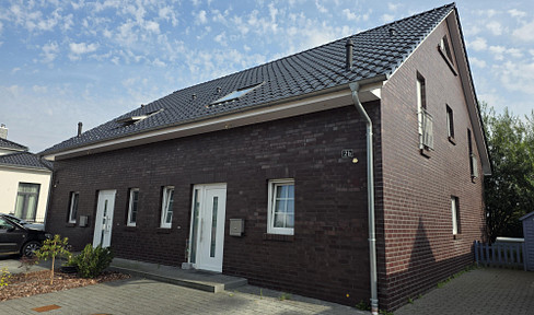 2 modern semi-detached houses, with potential for further development.
