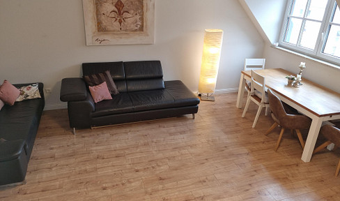 Bright 4-room maisonette apartment in Fürth, approximately 111 square meters of living and usable space. Includes a balcony, elevator, and underground parking. Available without commission.