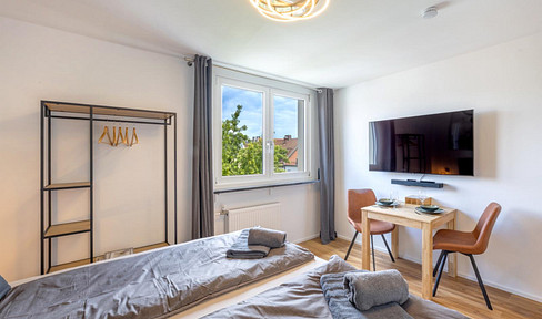 Exklusiv möbliert im Herzen Münchens: ruhiges Apartment im Lehel nahe Eisbach und Isar