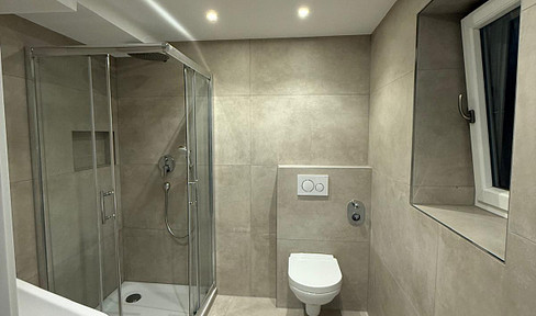 First occupancy after complete renovation | 2-room ground floor apartment with fitted kitchen.