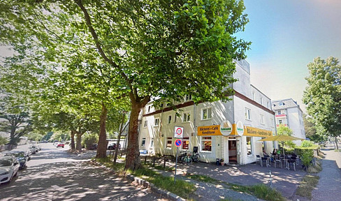 Multi-family house with 12 apartments + large building plot, for sale by owner.
