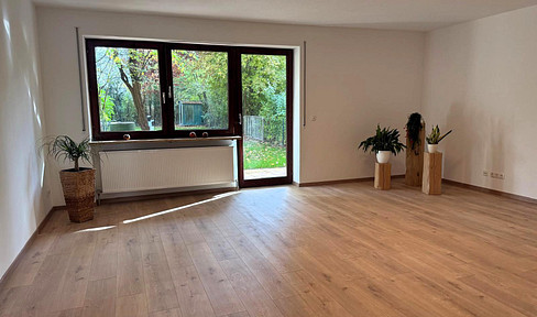 Plenty of space for the family – a terraced house with a garden, garage, and potential for further development.
