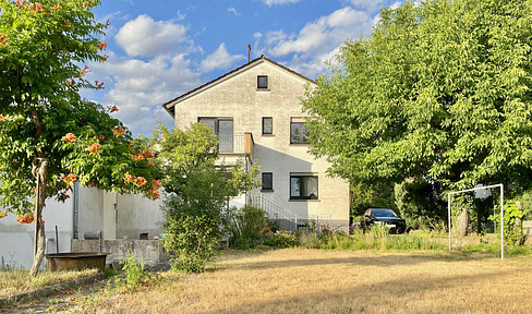 Two-family house in a prime residential location – partially renovated.