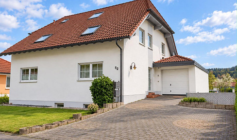 3-room ground floor apartment with a balcony and garage.