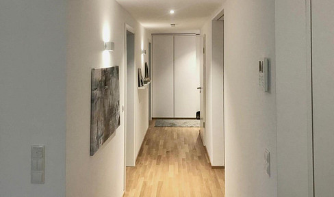 Modern, bright 95 m² ground-floor apartment with a garden, 2 terraces, a garage, and an elevator.