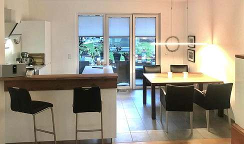 Modern apartment with a terrace, garden, garage, and elevator.